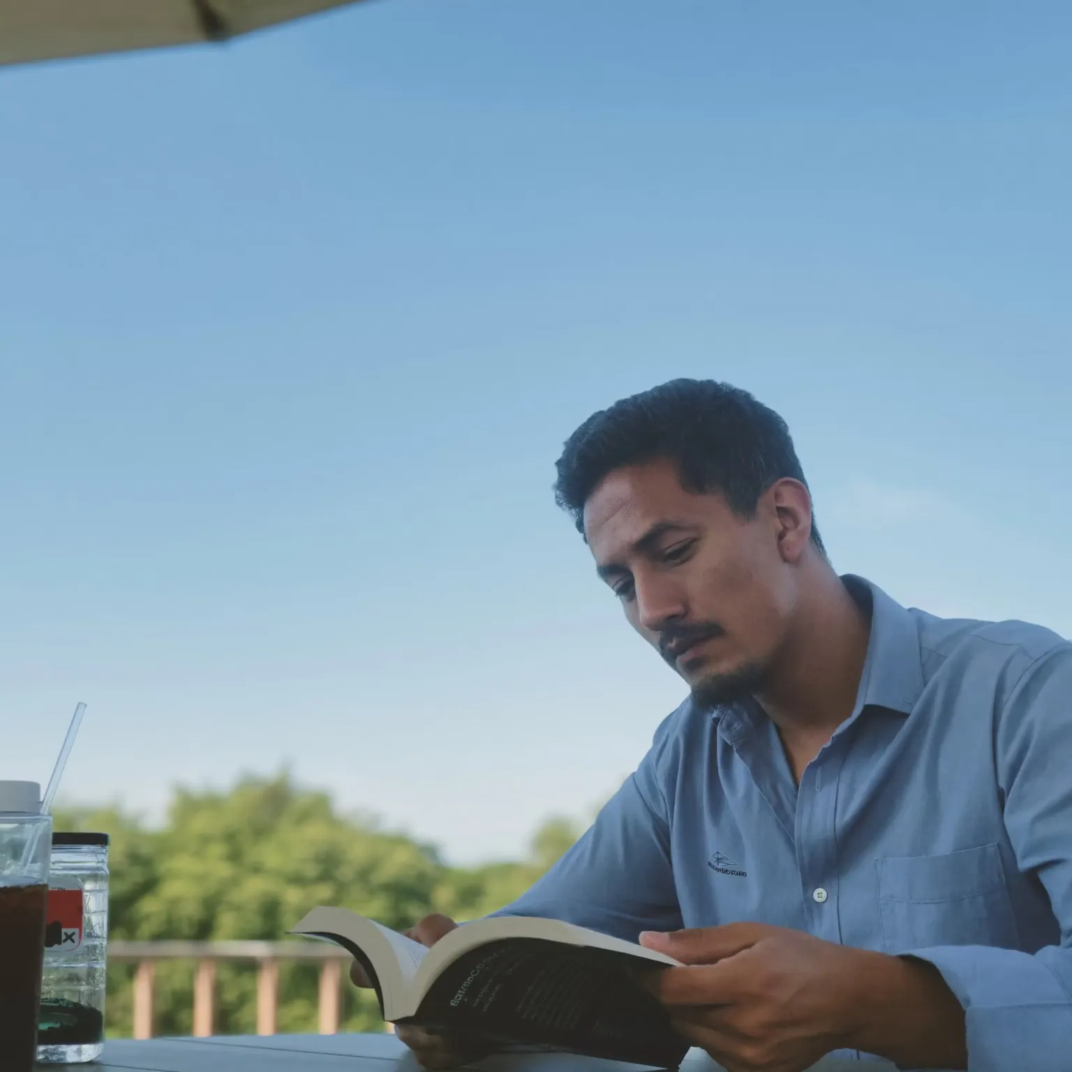 A man reading outdoors